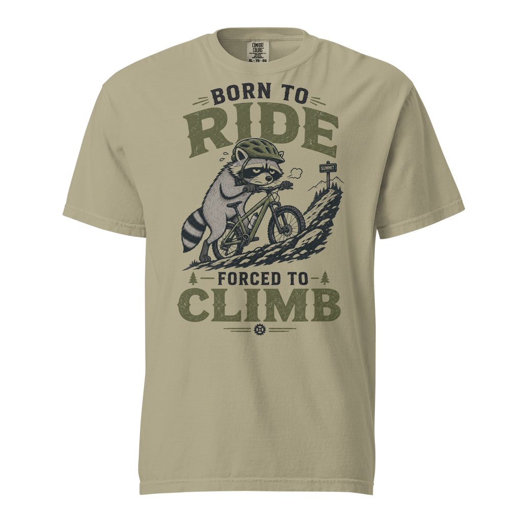 Khaki colored t-shirt with a graphic of a raccoon riding a bike and text 'Born to Ride, Forced to Climb'.