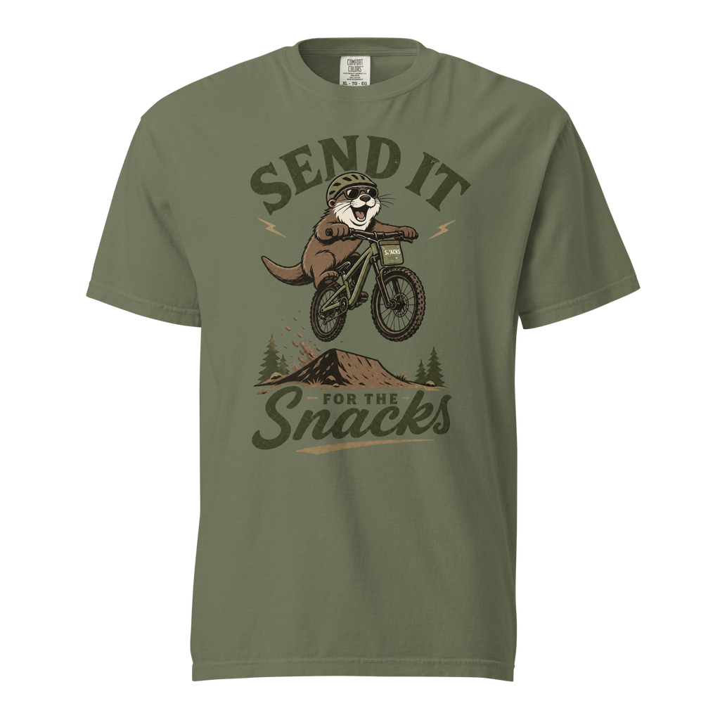 Moss green t-shirt with a graphic of an otter on a bike and text 'Send it for the snacks'.