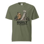 Moss green t-shirt with beaver graphic and 'Built Different' text on a white background