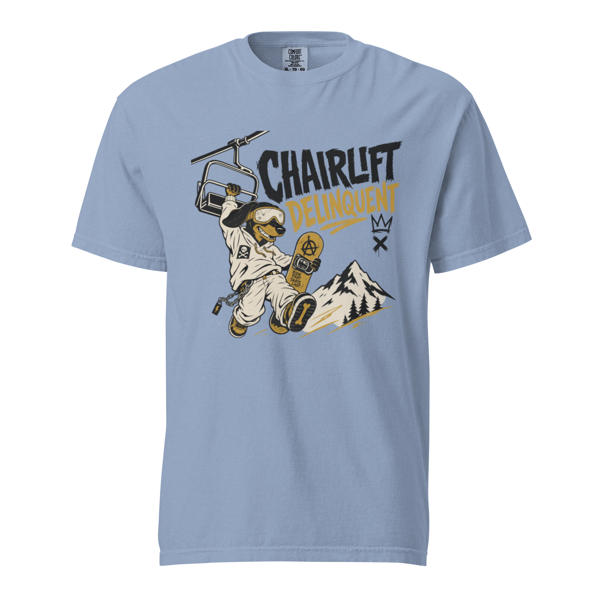 Washed denim blue t-shirt with a graphic of a skier on a chairlift and mountain, with text 'Chairlift Delinquent'.