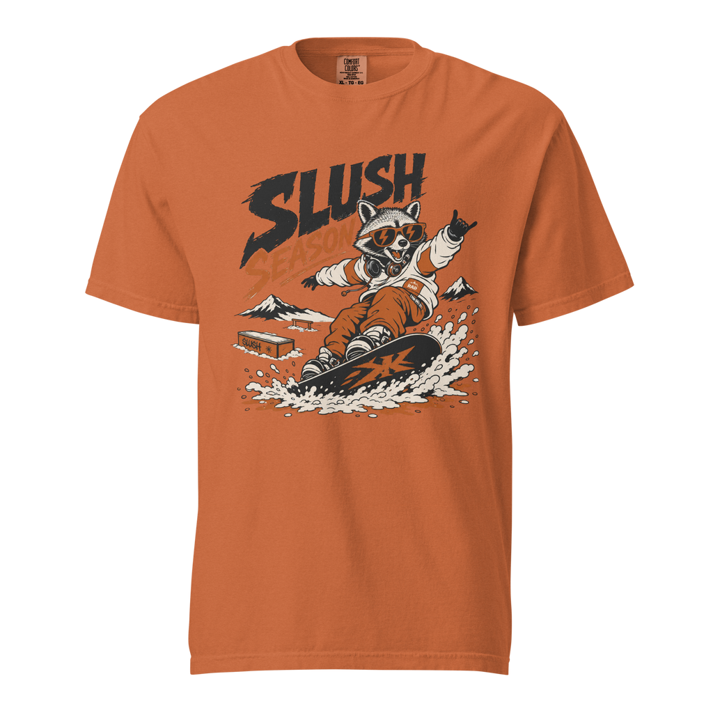 Yam colored t-shirt with a graphic of a raccoon snowboarding and the word 'SLUSH' on a white background.